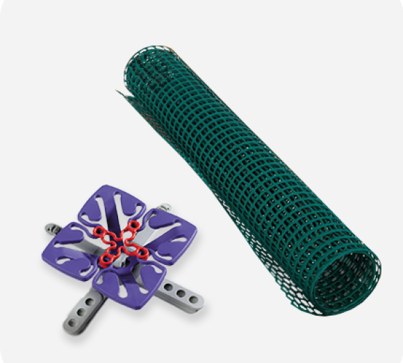 Froli Star Federelement mit Spannkreuz neben aufgerolltem Gitter